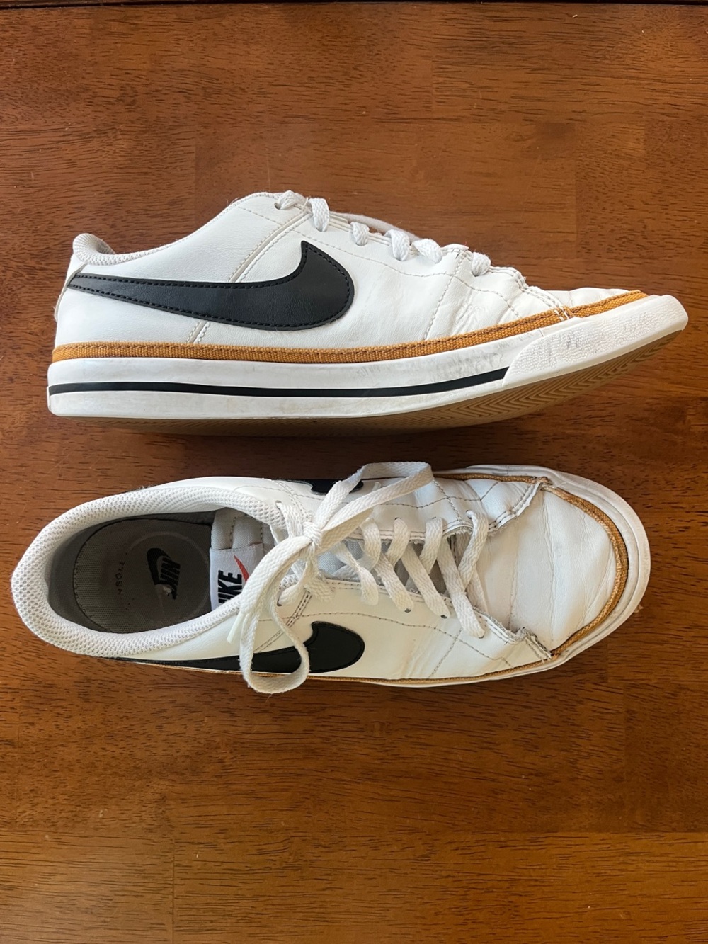 Nike White Low-Top Sneakers with Black Swoosh and Tan Trim Women